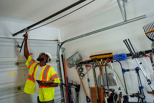 Professional Garage Door Panel Replacement technician working in Grant-Valkaria, FL